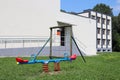 Lubno, Poland - july 9 2018:Children`s playground in the school yard. The eduction building of the younger generation. Walls with