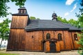 Lubowo, Poland - August 09, 2021. Old wooden st. Mikolaj Church - Kosciol pw. sw. Mikolaja Royalty Free Stock Photo