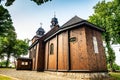 Lubowo, Poland - August 09, 2021. Old wooden st. Mikolaj Church - Kosciol pw. sw. Mikolaja Royalty Free Stock Photo