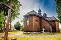 Lubowo, Poland - August 09, 2021. Old wooden st. Mikolaj Church - Kosciol pw. sw. Mikolaja Royalty Free Stock Photo