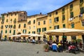 LUCCA, ITALY - MAY 7, 2015. The Famous Oval City Square on a Sunny Day in Lucca, Tuscany, Italy Royalty Free Stock Photo