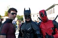 Cosplayers at the Lucca Comics masked by Batman & Robin and Deadpool