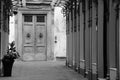 Lucca, Italy - 6 6 2022: Restaurant door in traditional Tuscan courtyard in Lucca, Italy