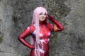 Cosplayer girl dressed as Zero Two, character from the Darling in the Franxx anime series.