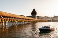 Lucerne Chapel Bridge in bright evening, Switzerland Royalty Free Stock Photo