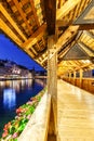 Lucerne Chapel Bridge KapellbrÃÂ¼cke city at Reuss river at twilight portrait format in Switzerland Royalty Free Stock Photo