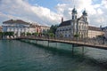 Lucerne Jesuit Catholic Church, one of the first large Baroque in Switzerland & Luzerner Theater with busy Rathaussteg bridge