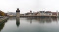 Lucerne, LU / Switzerland - November 9, 2018: the famous Swiss city of Lucerne cityscape skyline and Kappel bridge with water towe