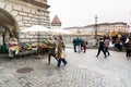 Lucerne, LU / Switzerland - November 9, 2018: many busy pedestrians and passersby and people crossing a bridge and a town square w Royalty Free Stock Photo