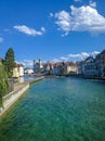 Lucerne, Switzerland - August 18, 2019: Beautiful view of the architecture of the old city and the Jesuit church against the blue