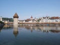 Representative historical buildings, chapel bridge and tower at Reuss river in beauty european city at Switzerland