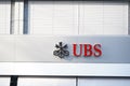 Close up view on Logo of a Swiss bank UBS on the facade of a building.