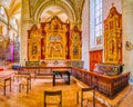 Panorama of interior of St Leodegar Church with side chapels with golden altarpieces, on March 30 in Lucerne, Switzerland