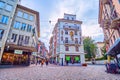 Urban scene on Falkenplatz square with historical houses with frescoes in Lucerne, Switzerland