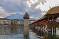 Lucerne, Switzerland-October 18,2019:The old wood Chapel Bridge is famous and beautiful landmark in Lucerne, Switzerland