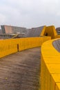 The Luchtsingel is a yellow-painted wooden footbridge in Rotterdam, NL