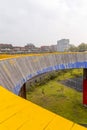 The Luchtsingel is a yellow-painted wooden footbridge in Rotterdam, NL