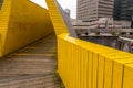 The Luchtsingel is a yellow-painted wooden footbridge in Rotterdam, NL