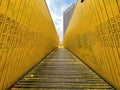 The Luchtsingel is a yellow-painted wooden footbridge in Rotterdam, NL