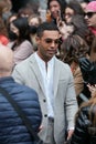 Lucien Laviscount before Emporio Armani fashion show, Milan Fashion Week street style Royalty Free Stock Photo