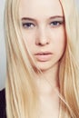 Lucious lips and flawless skin. Closeup portrait of a beautiful young blonde woman.