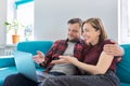 Luck, happiness, joy, victory, won, happy emotional middle aged couple looking in laptop Royalty Free Stock Photo