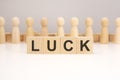 LUCK - word composed from wooden blocks letters on white background, copy space for text Royalty Free Stock Photo