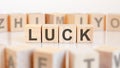 luck - word on wooden cubes on white background, concept Royalty Free Stock Photo