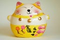 Lucky Cat Doll The symbol of good fortune in trading Maneki Neko Royalty Free Stock Photo