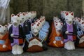 Lucky cats for Japanese pray luck in the temple