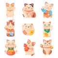 Lucky cats. Traditional japanese cat statuettes, maneki neko japan kitten, cartoon money or fortune chinese souvenirs Royalty Free Stock Photo