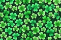 Lucky Charm: Central Focus on Four-Leaf Clover, Symbol of Luck for St. Patrick\'s Day - Seamless Background Pattern Royalty Free Stock Photo