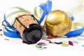 Lucky charm talisman with confetti, cork, champagne bottle. Happy New Year. New years eve Royalty Free Stock Photo