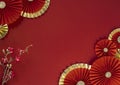 Lucky Chinese new year red background decoration with cherry blossom flower and paper fan