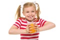 Lucky girl drinking orange juice through straw Royalty Free Stock Photo