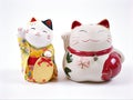 Lucky japanese cat souvenir ,maneki neko happy cat isolated on white background, kimono cute cat Royalty Free Stock Photo