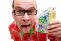 Lucky man with handful of money Royalty Free Stock Photo