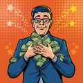 A lucky manager in a business suit holds a big pile of money. Front view