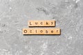 Lucky october word written on wood block. lucky october text on table, concept Royalty Free Stock Photo