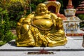 Lucky seated golden Buddha in Wat Wanararm or What Kho Wanararm Temple in Langkawi island, State of Kedah, Malaysia