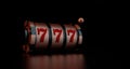 Lucky seven 777 slot machine. Vegas casino game. Chance of good luck in gambling. Royalty Free Stock Photo