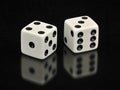 Lucky Sevens White Dice on Black Background Royalty Free Stock Photo