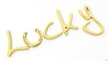 Lucky word written in gold with horseshoe as a U