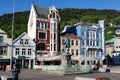 Ludvig Holberg Statue with the historical colorful houses of Bergen in the background, Norway