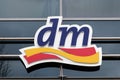 Luebeck, Germany - February 1, 2018: logo of the DM drogeriemarkt store, a German chain of retail drugstores for