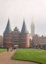 LUEBECK, Germany. Holsten Gate Holstentor, city gate UNESCO World Heritage Site and St. Petry zu Luebeck.