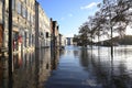 LUEBECK, GERMANY, JANUARY 2, 2019: Floodwater of the River Trave in the historic old town of Luebeck, Germany, blue sky, copy