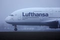 Lufthansa A380 Airbus plane taxiing on runway, cabin crew close-up view Royalty Free Stock Photo