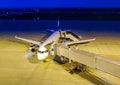 Lufthansa aircraft is being prepared for take-off at night on the apron of Dresden Airport Royalty Free Stock Photo