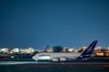 Lufthansa airplane jet landing at MIA night photo